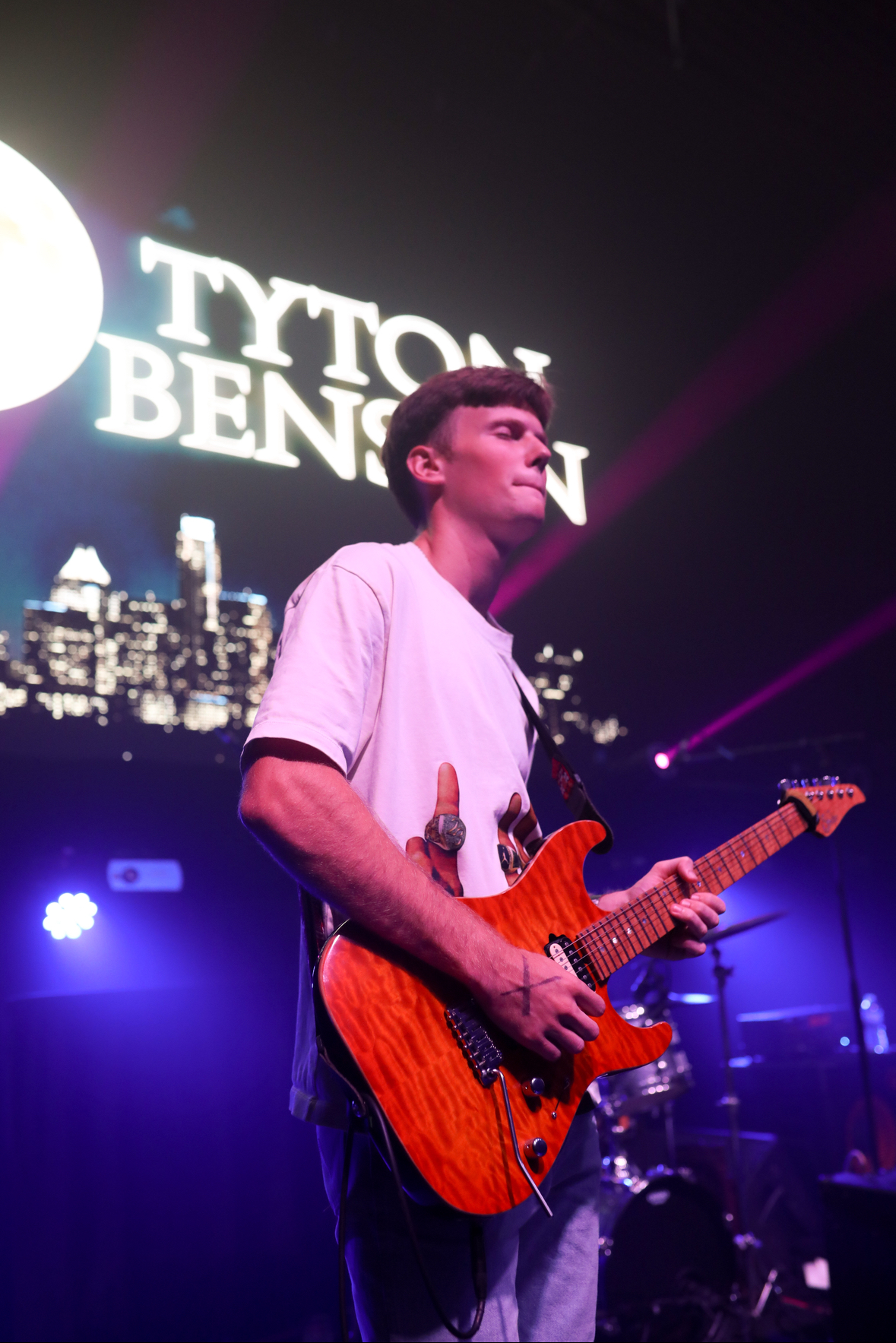 Evan MacGregor performing live on stage with Tyton Benson